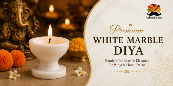 Premium White Marble Diya for pooja and home decor with Lord Ganesha statue and festive floral decoration.